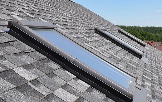 Skylight installation on a shingle roof